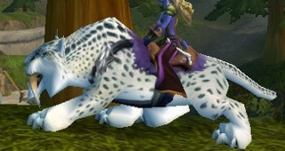 Rênes de sabre-de-givre tacheté - Monture World of Warcraft