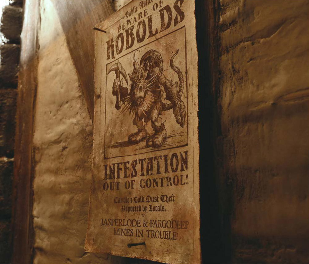 Photo tirée du film Warcraft : une affiche qui prévient l'infestation des Kobolts dans la mine